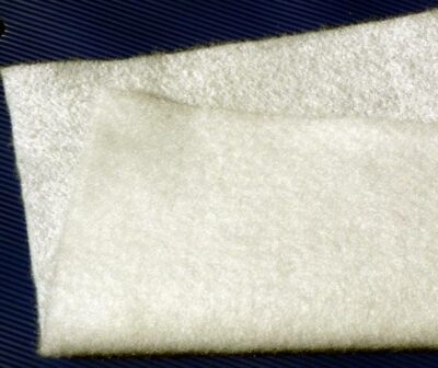 Fleece for separation of soil and base layer