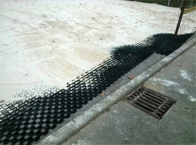 Parking space with professional ground reinforcement with TERRA-GRID