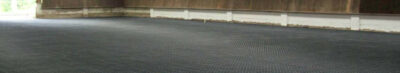 Ground reinforcement of indoor riding arena after installation of TERRA-GRID E 35
