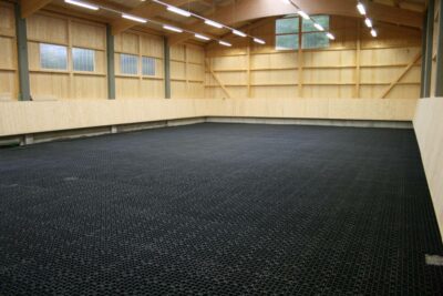 Paddock grids in finished indoor riding arena